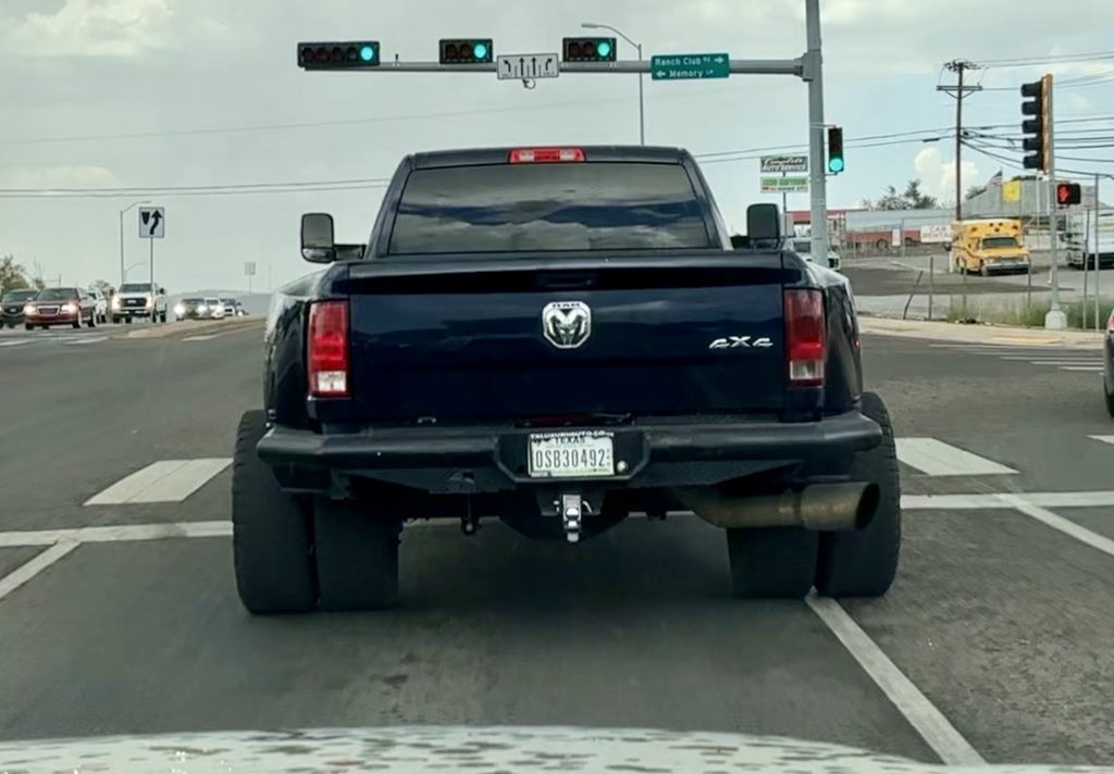 Documented coal roller with Texas plates.